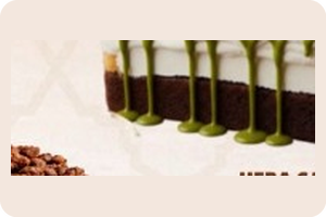 Heba Cake drips in zero gravity. The chocolate-pistachio fusion you deserve. 🌌